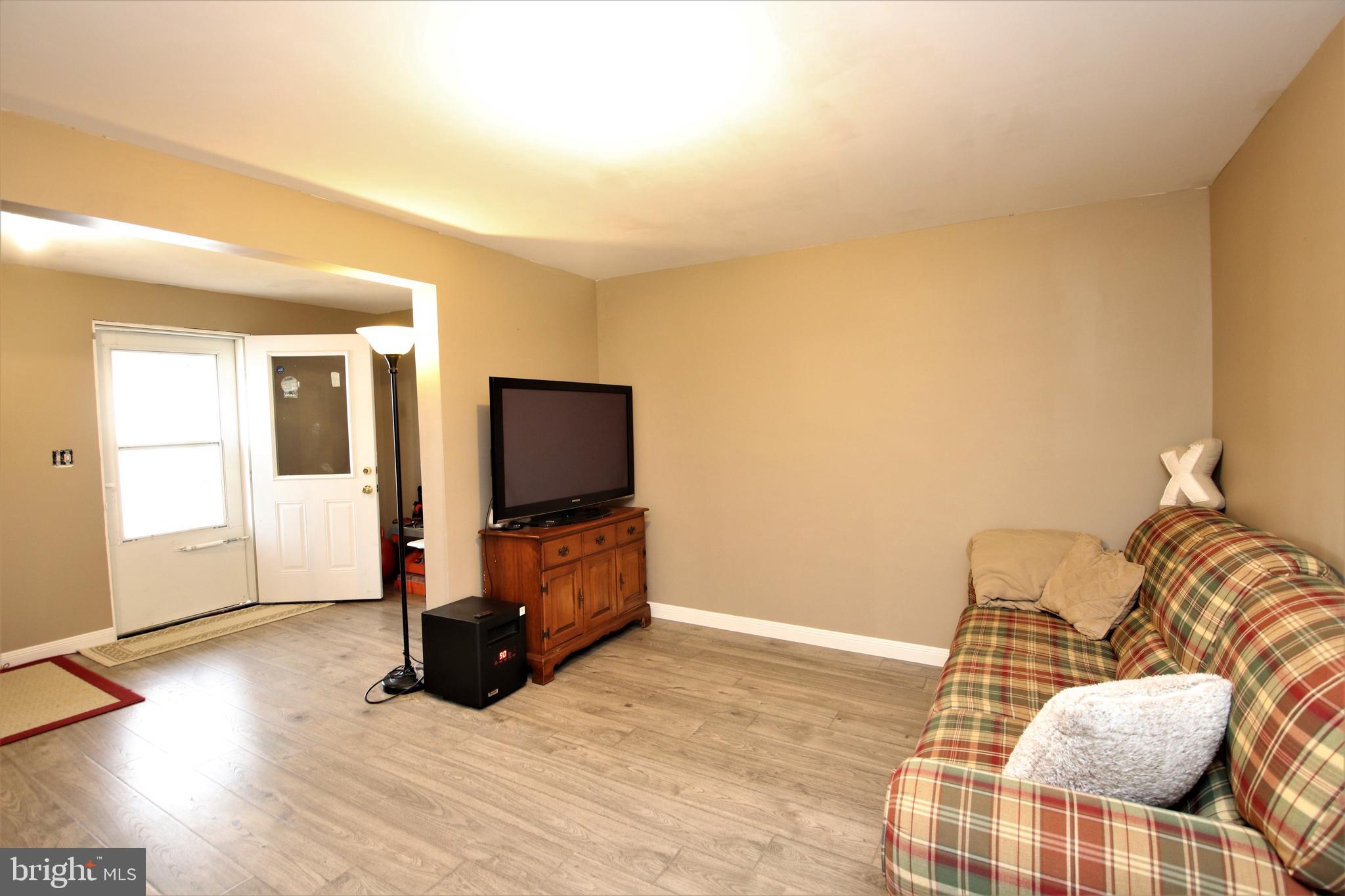 238 Rumbling Rock Road Hedgesville, WV 25427 - Photo 21 of 27 Lower Level Family Room
