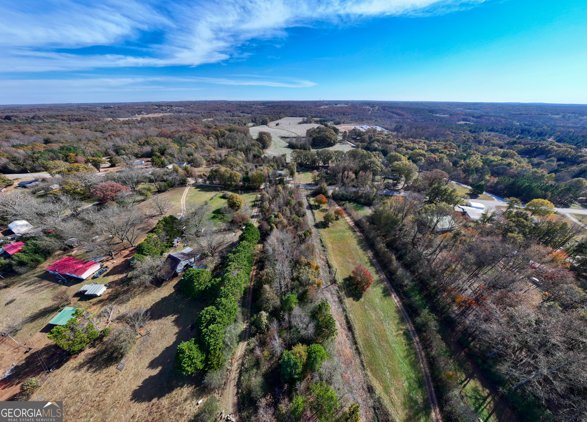 6.98-acres New Franklin Church Road Canon, GA 30520 - Photo 13 of 14 an aerial view of residential house with outdoor space