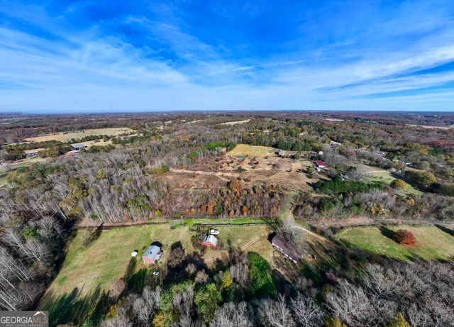 an aerial view of residential house with outdoor space