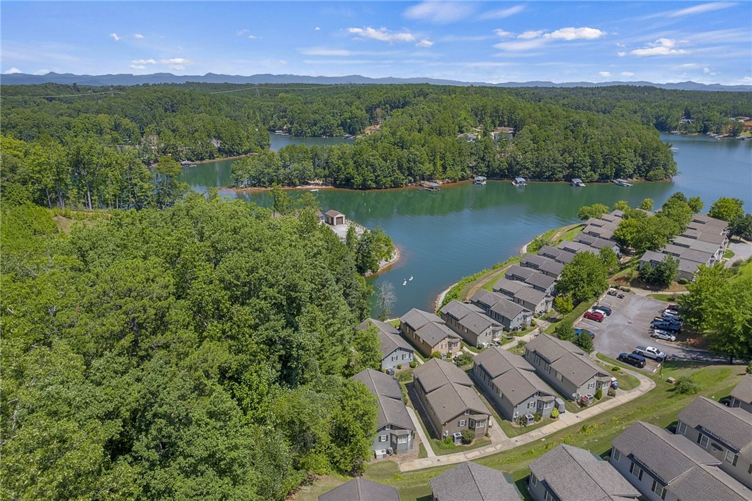 1230 Melton Road, Unit 82 West Union, SC 29696 - Photo 34 of 50 Perched above the tranquil lake, a community of cottages offers captivating water views.