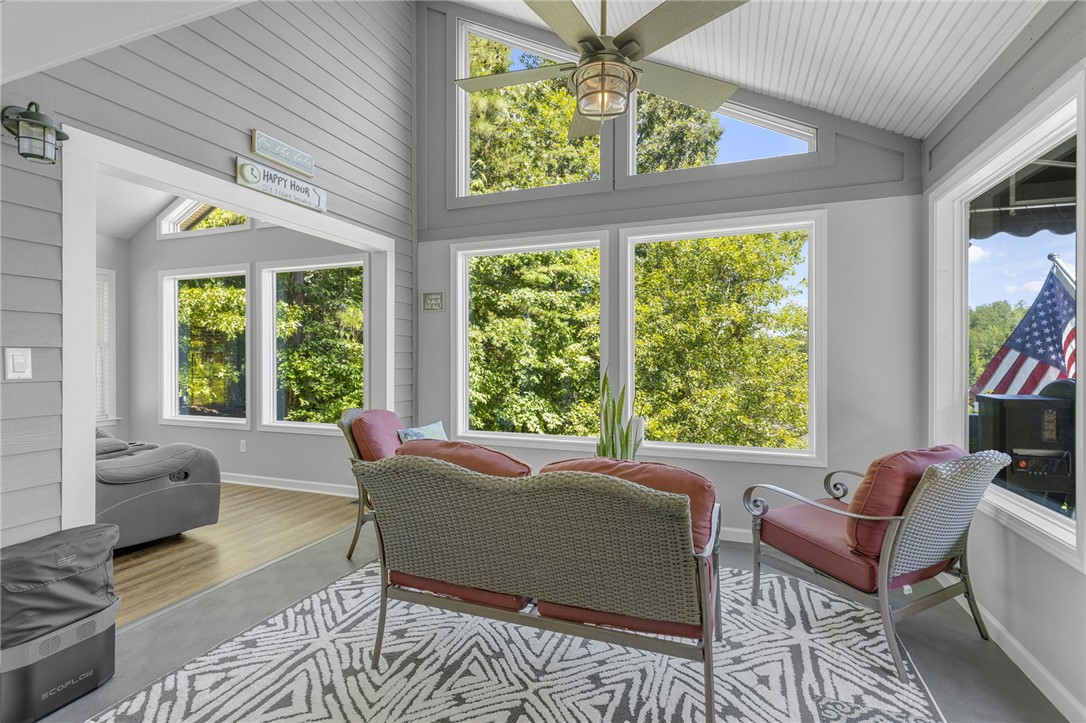 1230 Melton Road, Unit 82 West Union, SC 29696 - Photo 8 of 50 This bright sunroom offers abundant natural light and an airy vaulted ceiling.