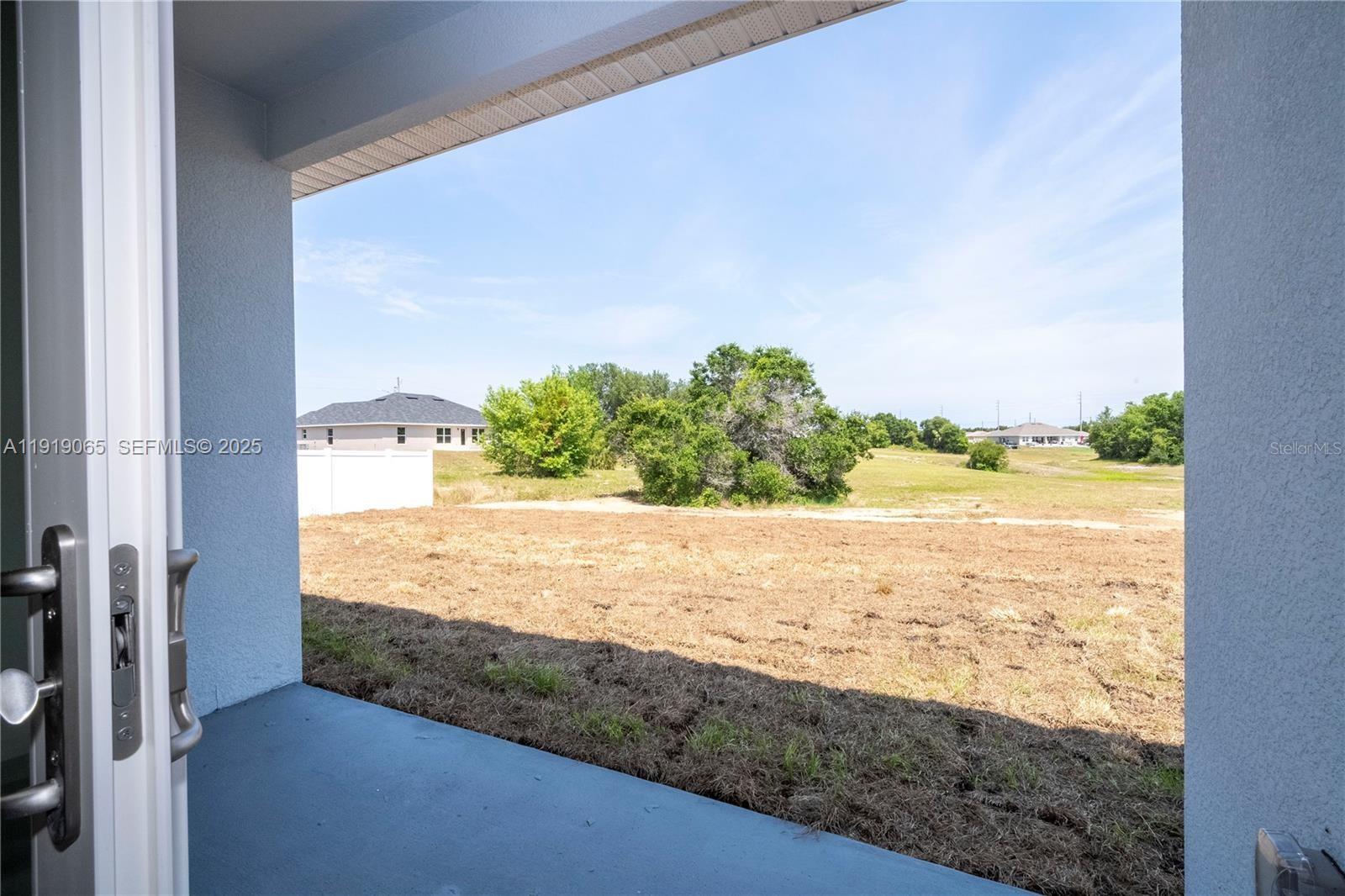 873 Colville Drive, Unit 873 Kissimmee, FL 34759 - Photo 19 of 47 a view of beach and ocean