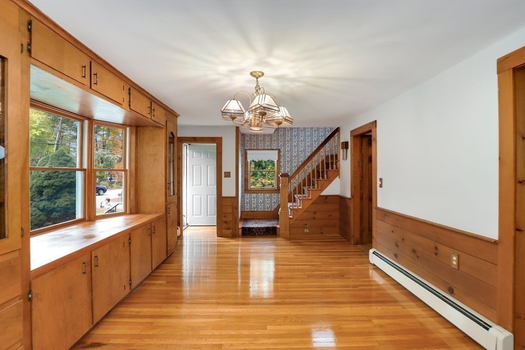 79 Dalton Road Chelmsford, MA 01824 - Photo 12 of 40 a view of entryway and hall with wooden floor