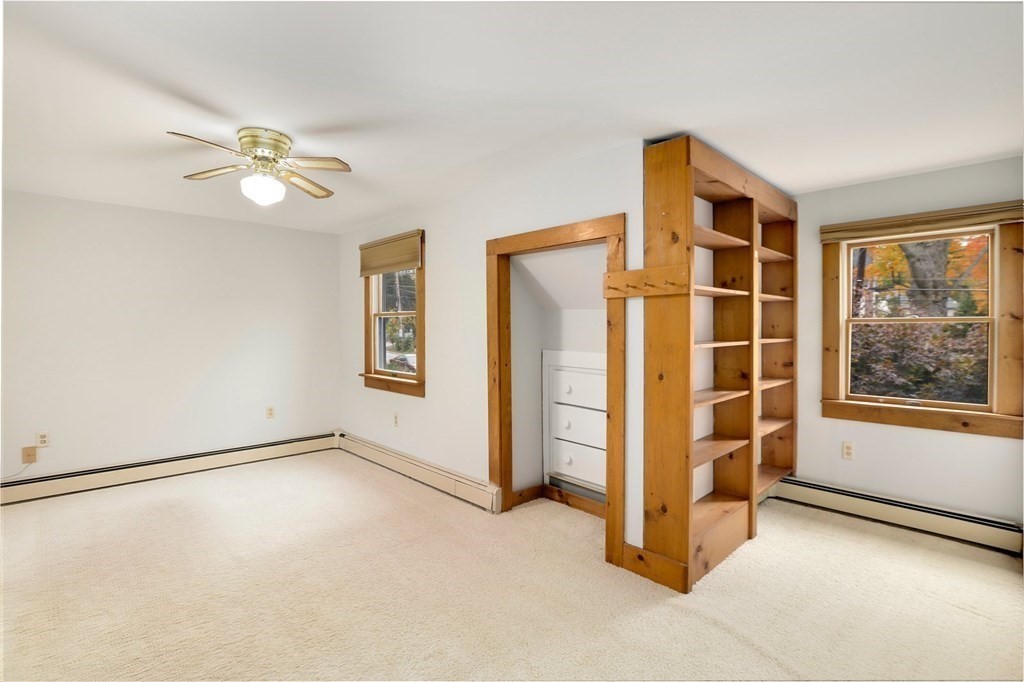 79 Dalton Road Chelmsford, MA 01824 - Photo 31 of 40 wooden floor in an empty room with a window