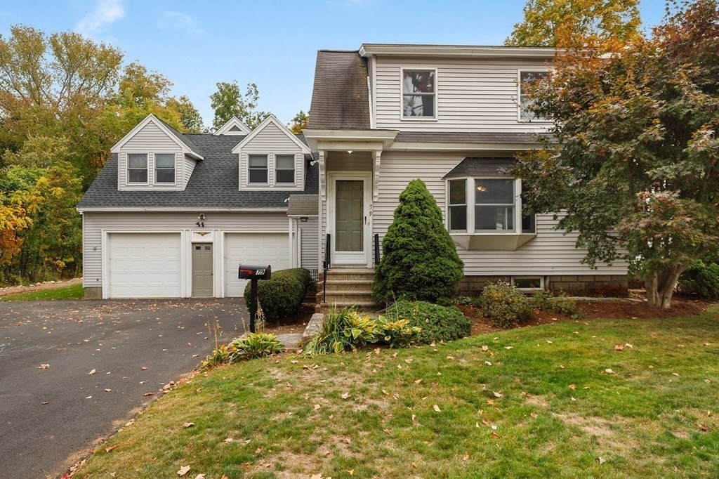 79 Dalton Road Chelmsford, MA 01824 - Photo 40 of 40 a front view of a house with a yard