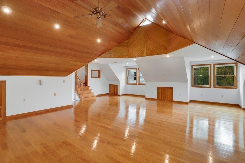 79 Dalton Road Chelmsford, MA 01824 - Photo 8 of 40 a view of an empty room with window and wooden floor
