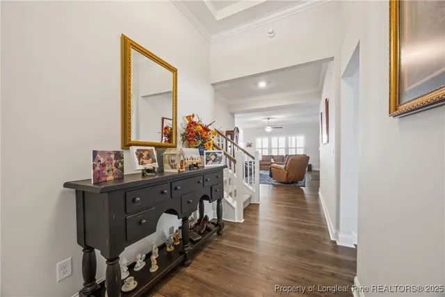 a view of a hallway with living room