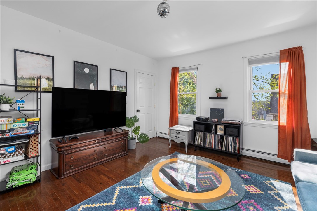 89 Knowles Street Providence, RI 02906 - Photo 33 of 48 2nd floor living room bright and airy with high ceilings
