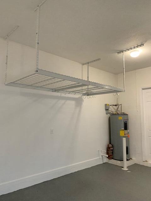 6729 Bulrush Court Greenacres, FL 33413 - Photo 13 of 35 a view of a room with racks on the wall