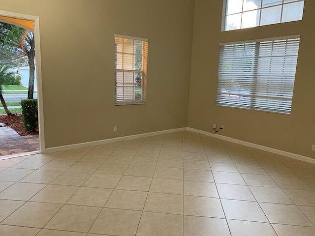 6729 Bulrush Court Greenacres, FL 33413 - Photo 23 of 35 a view of an empty room with a window