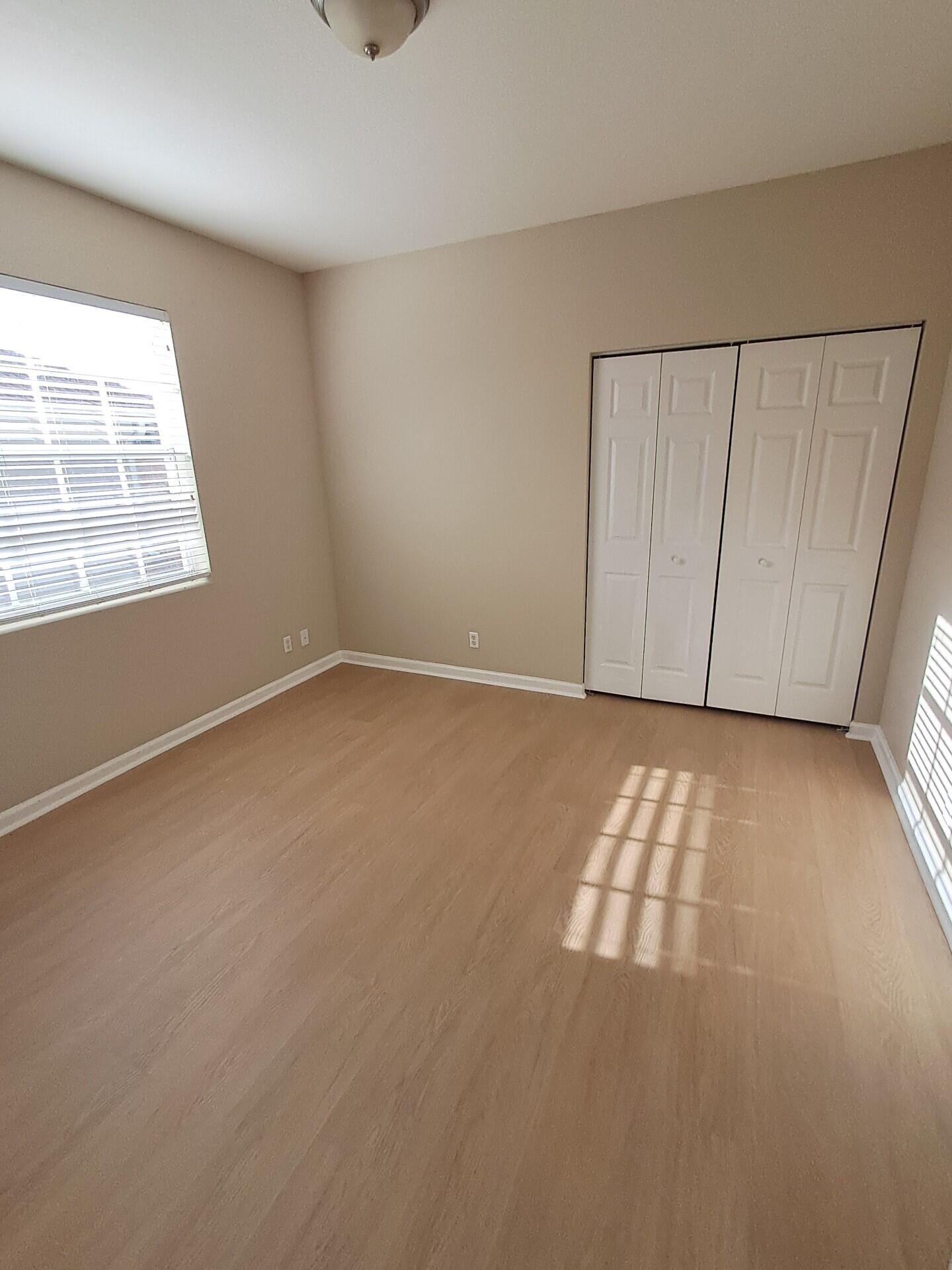 6729 Bulrush Court Greenacres, FL 33413 - Photo 25 of 35 an empty room with windows