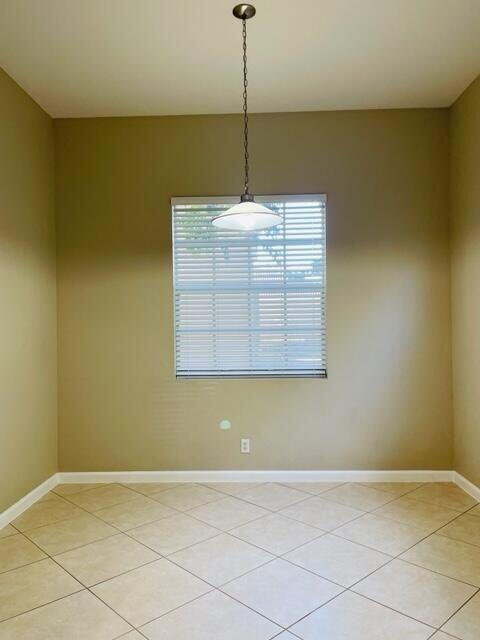 6729 Bulrush Court Greenacres, FL 33413 - Photo 35 of 35 a view of a small space with wooden floor