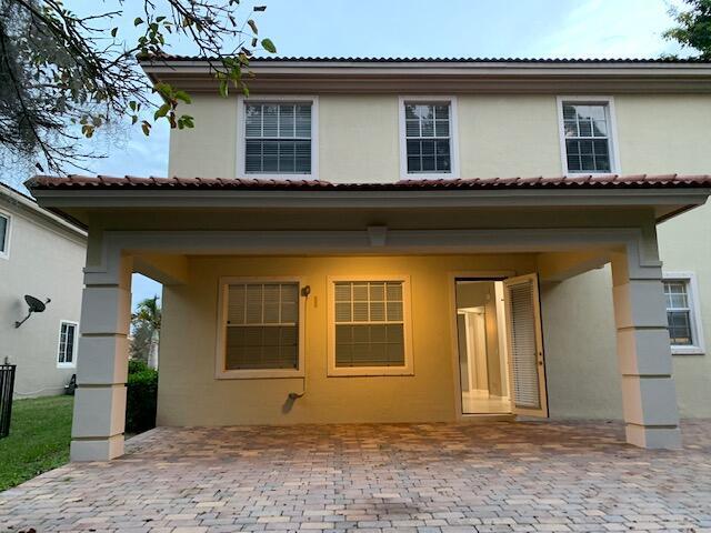 6729 Bulrush Court Greenacres, FL 33413 - Photo 6 of 35 a front view of a house