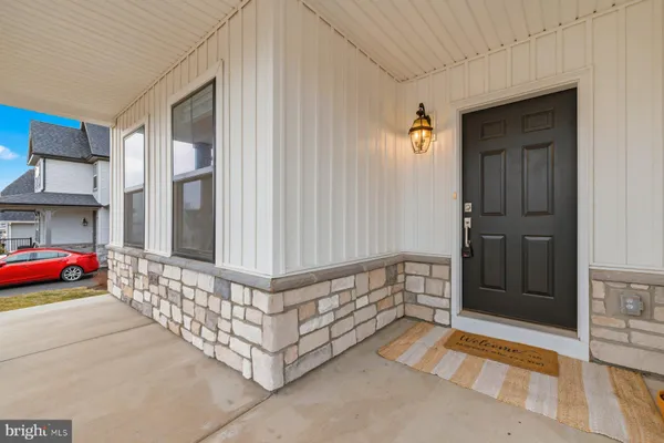 a view of front door with outdoor space