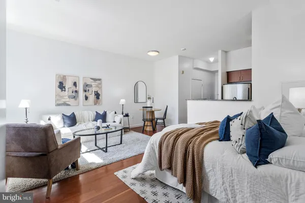 a bed room with a bed and a couch