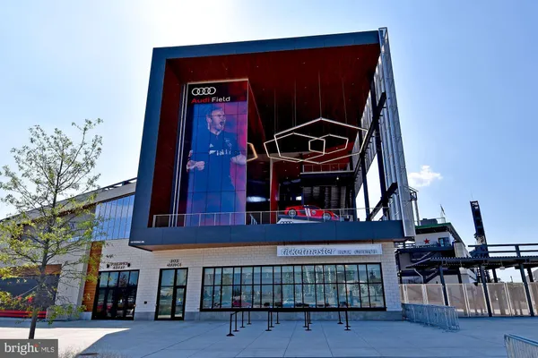 a view of a building with sitting area