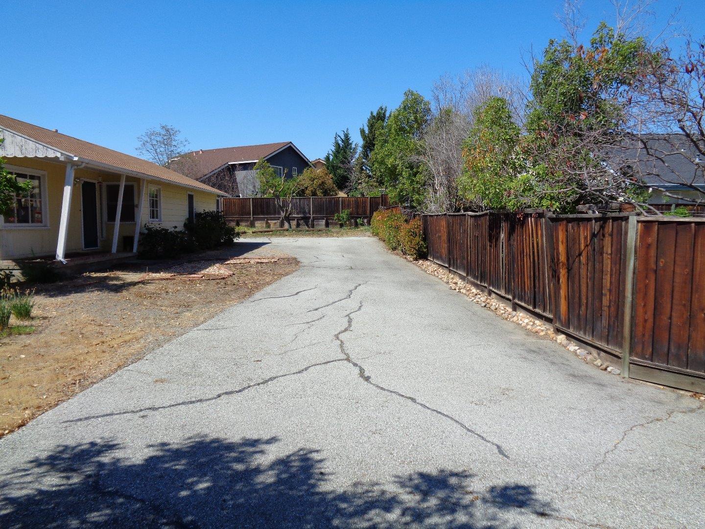 2739 Klein Road San Jose, CA 95148 - Photo 2 of 23 a wooden bench sitting in front of a house
