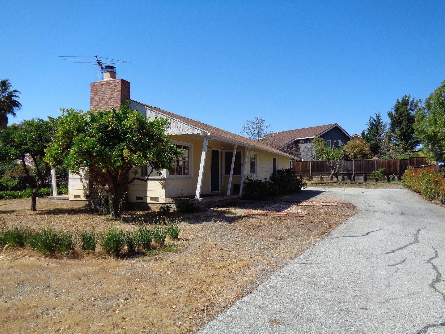 2739 Klein Road San Jose, CA 95148 - Photo 3 of 23 a pathway of a house with a yard