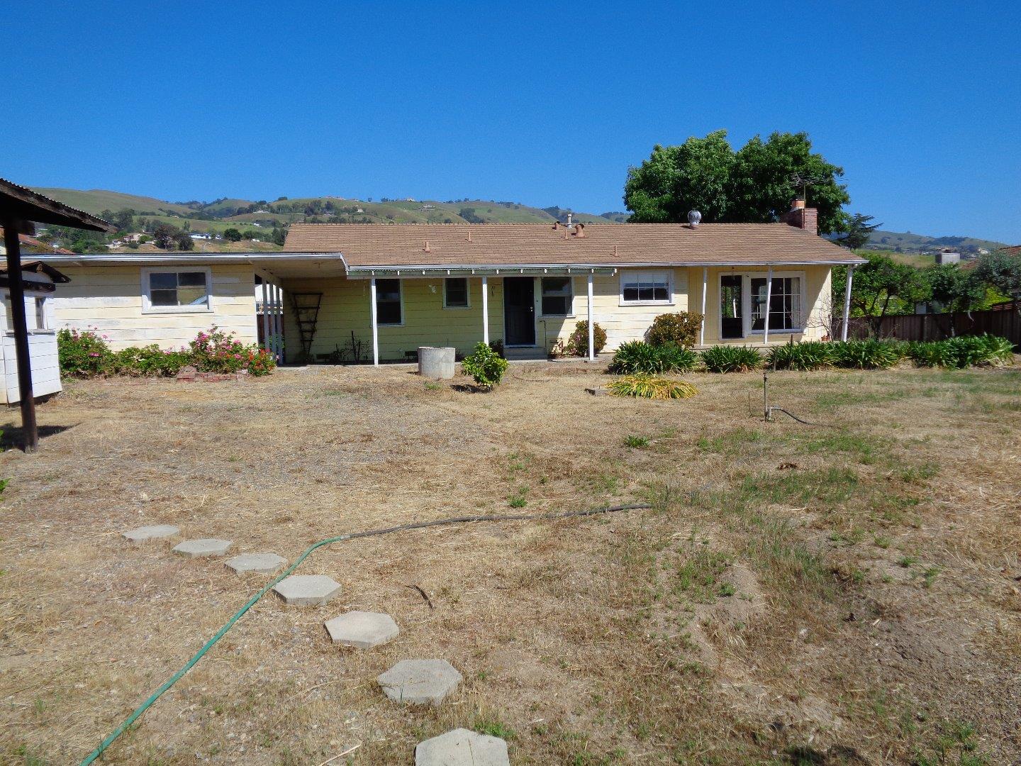 2739 Klein Road San Jose, CA 95148 - Photo 5 of 23 a front view of a house with a yard and seating space