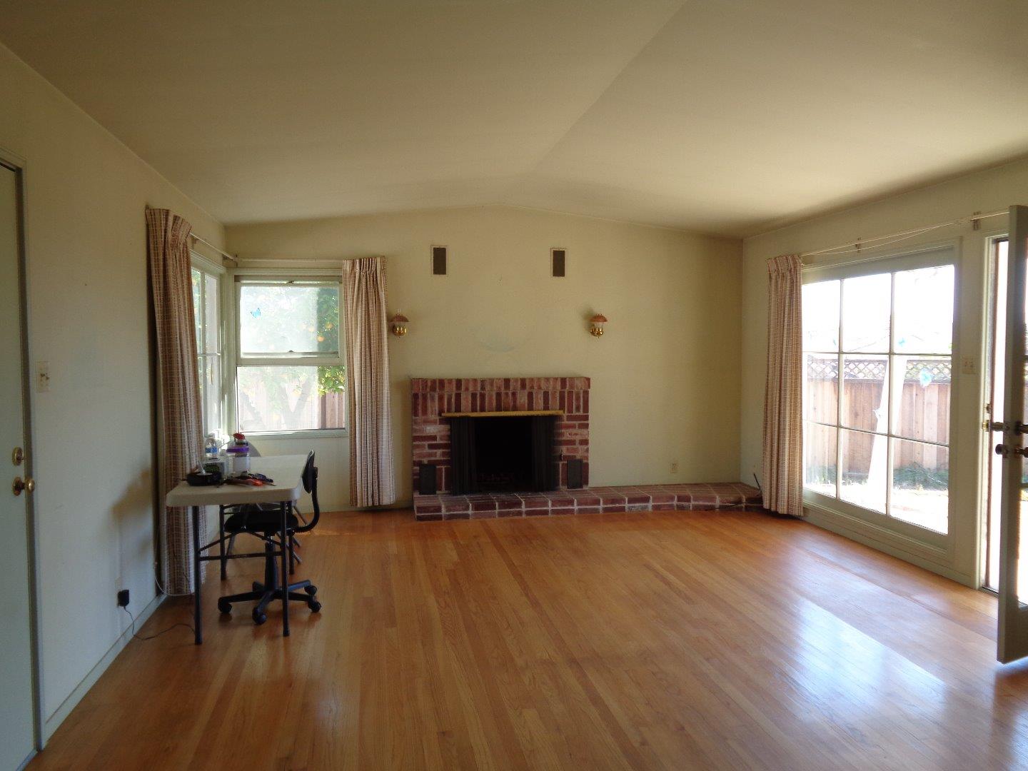 2739 Klein Road San Jose, CA 95148 - Photo 9 of 23 a view of a livingroom with furniture and a fireplace
