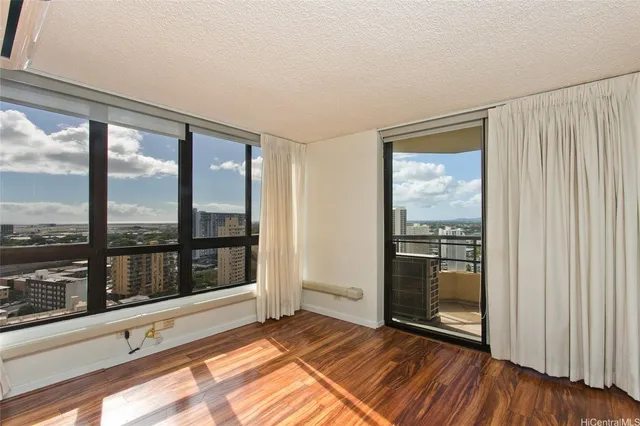 a view of an empty room and window