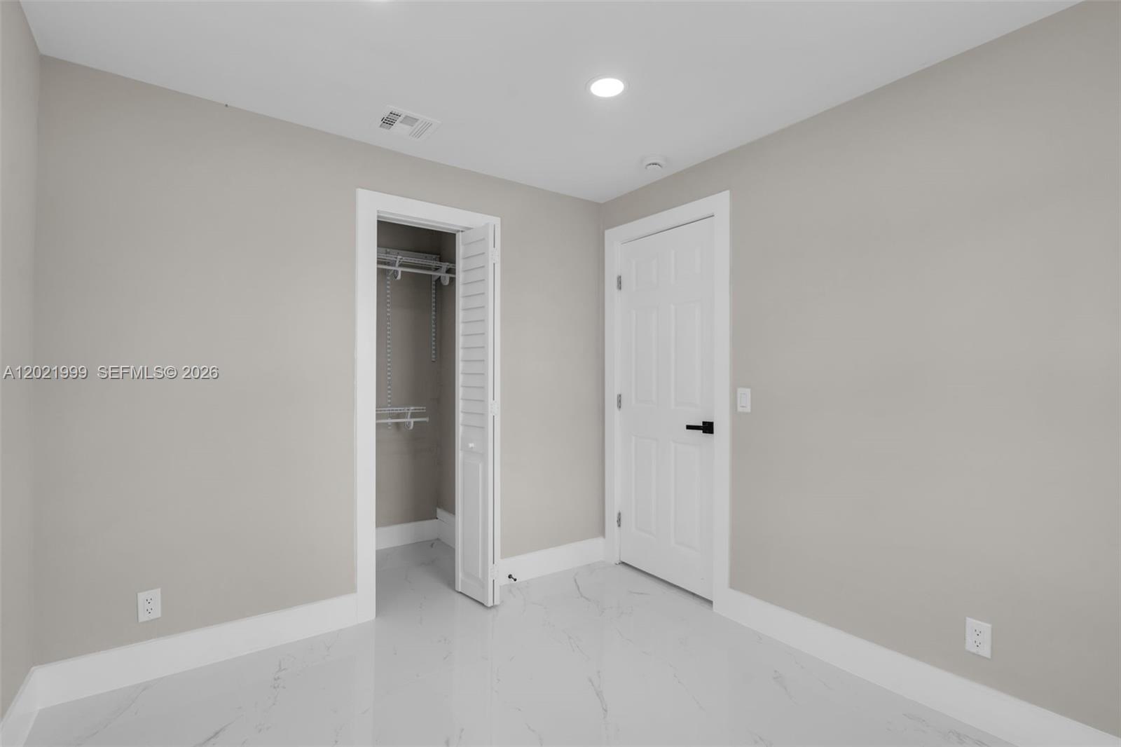 1660 West 26th Street Riviera Beach, FL 33404 - Photo 12 of 28 a view of an empty room