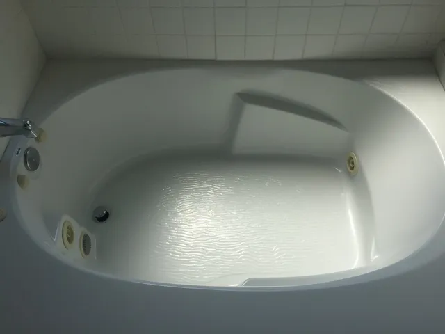 a bathroom with a sink and vanity