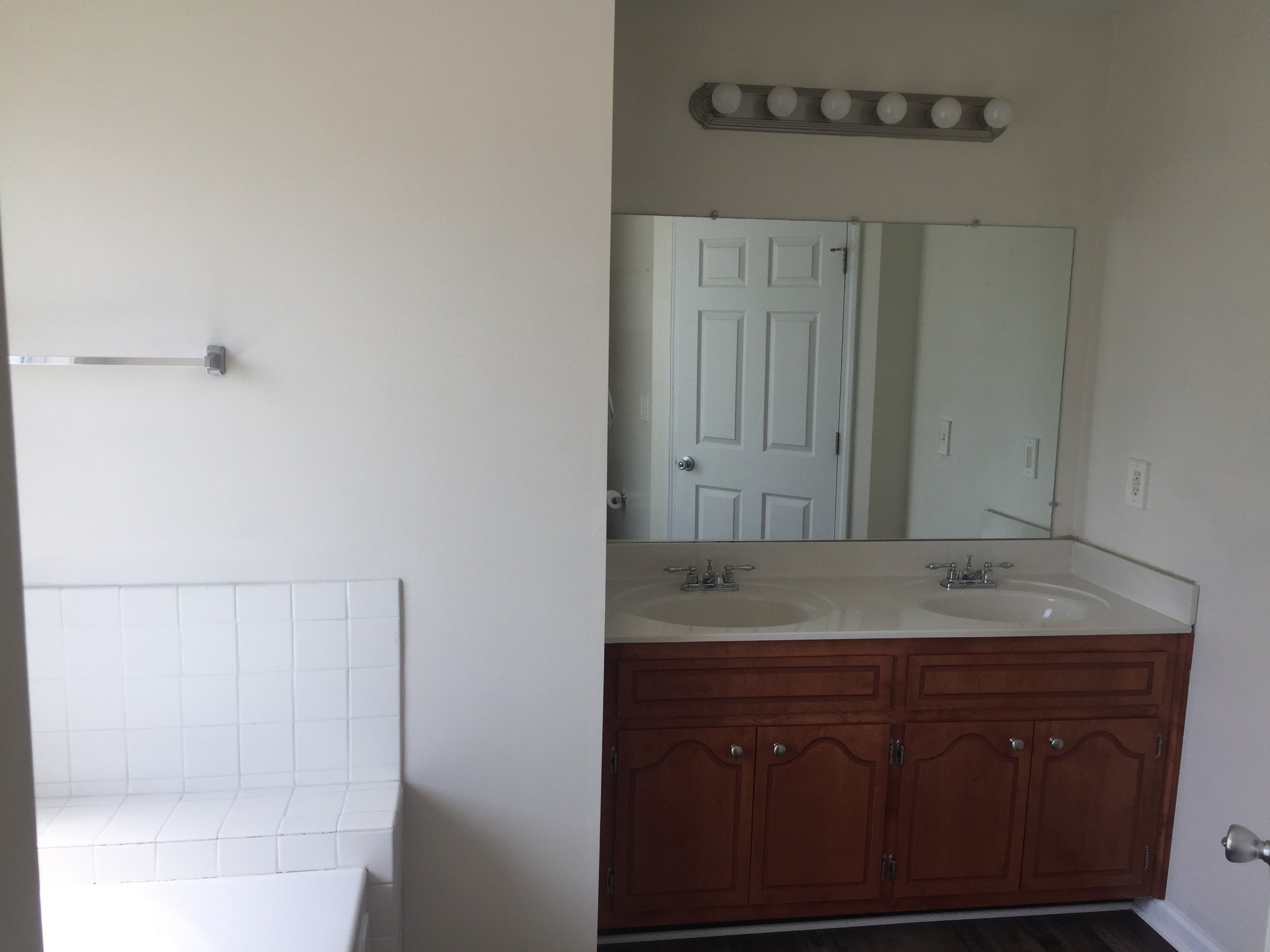 1528 Tylertown Road Clarksville, TN 37040 - Photo 21 of 31 a bathroom with a granite countertop sink and a mirror