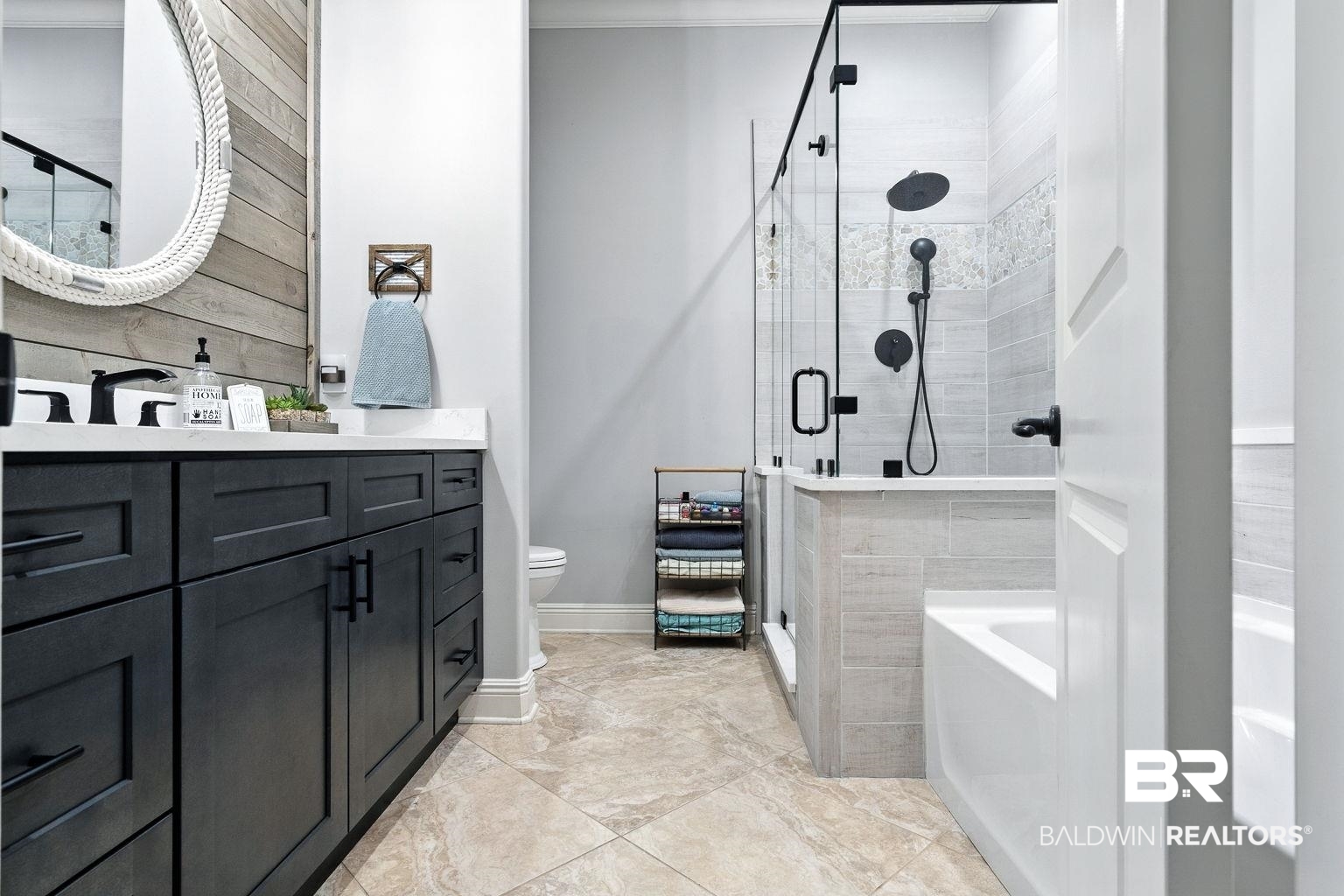 23357 Carnoustie Drive Foley, AL 36535 - Photo 66 of 99 Bathroom with vanity, a shower stall, and a garden tub