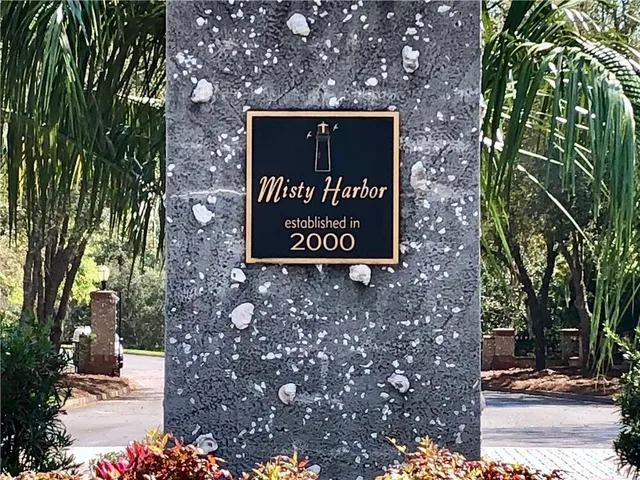 a sign that is sitting on the side of a road