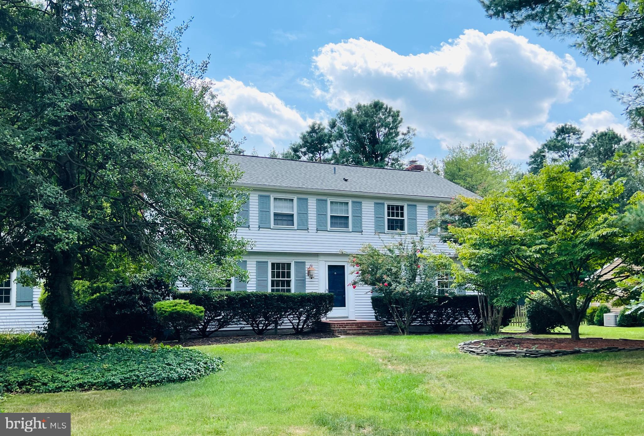 318 Tavistock Drive Medford, NJ 08055 - Photo 1 of 19 a view of a house with a yard and plants