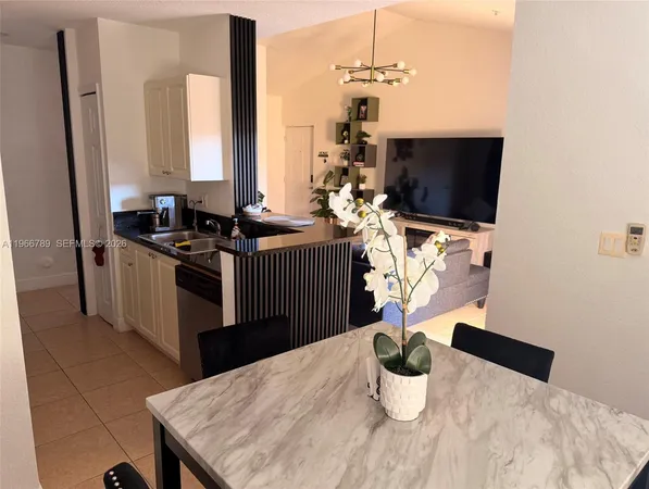 a kitchen with a stove and a microwave