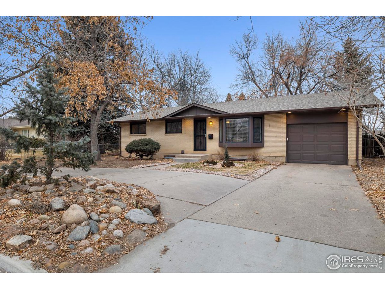 404 East Drake Road Fort Collins, CO 80525 - Photo 3 of 30 Clean, well-maintained brick ranch built in 1964.
