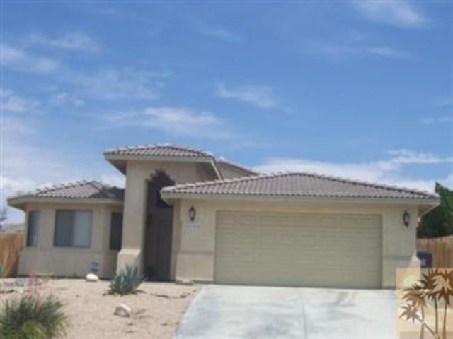 66844 8th Street Desert Hot Springs, CA 92240 - Photo 1 of 6 a front view of a house
