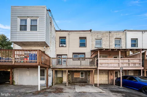 a front view of a building with glass windows