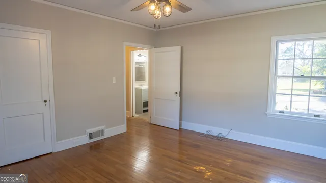 a bathroom with a sink mirror toilet and bathtub