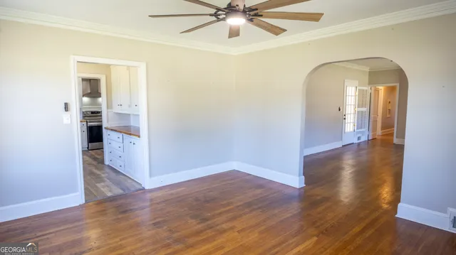 a kitchen with a refrigerator and window
