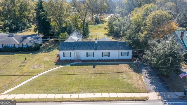 a view of a car in front of house