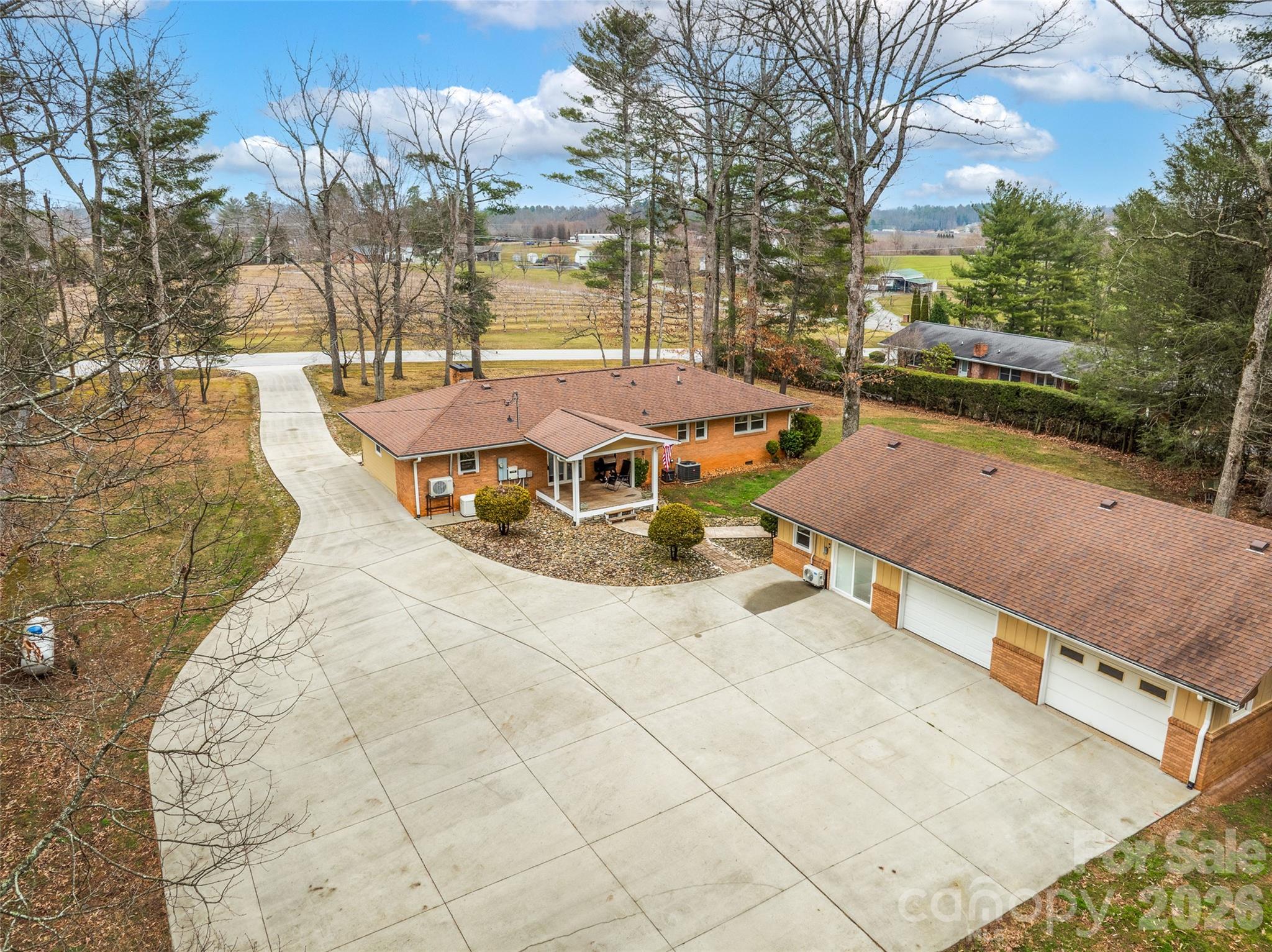 1034 South Orchard Road Flat Rock, NC 28731 - Photo 1 of 30 a view of a swimming pool with a patio