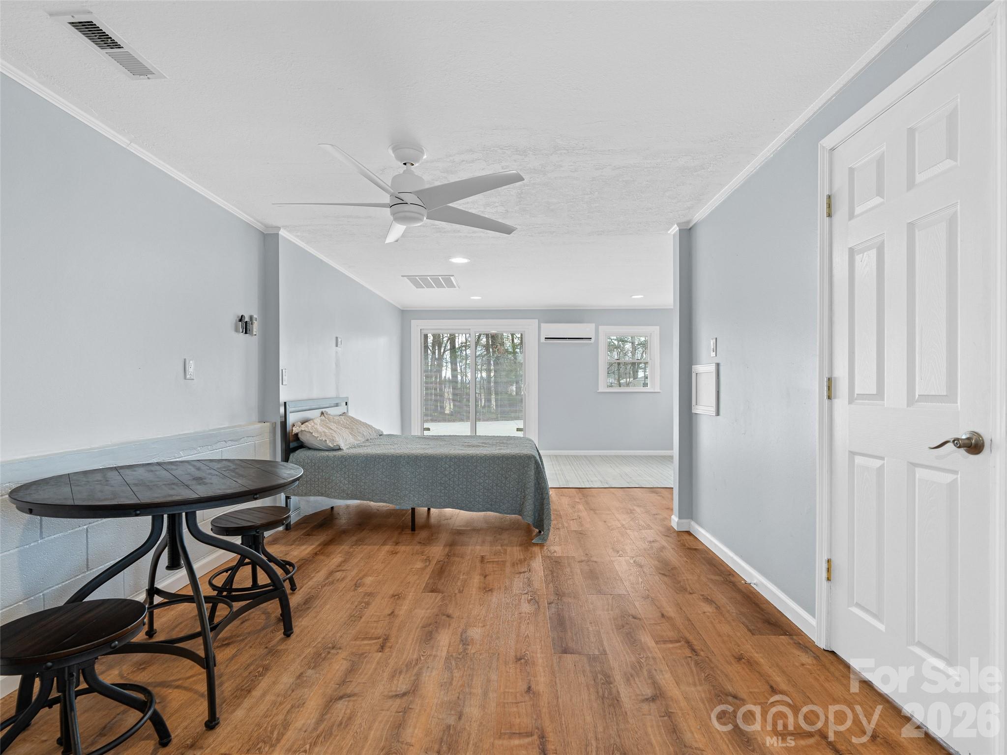 1034 South Orchard Road Flat Rock, NC 28731 - Photo 27 of 30 a living room with furniture and wooden floor