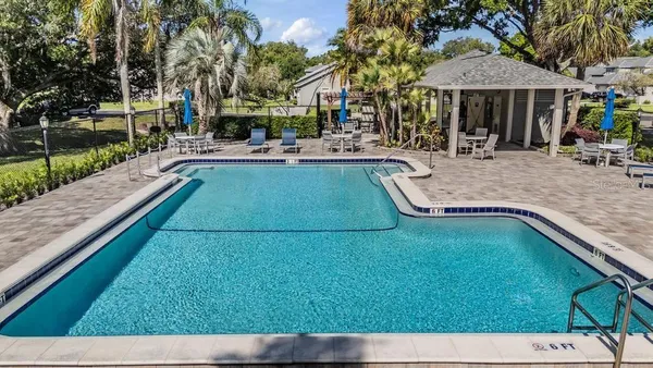 a view of a swimming pool and outdoor space