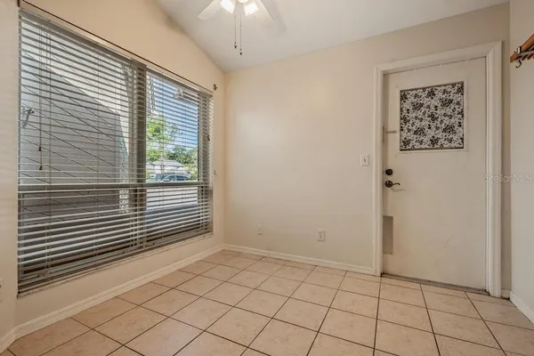 a view of an empty room and window