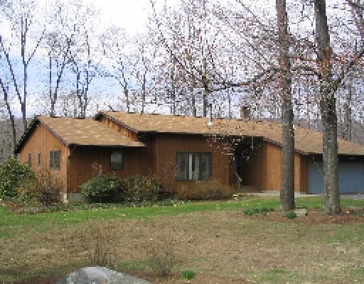 50 Highland Road Kent, CT 06757 - Photo 1 of 1 a front view of house with a garden