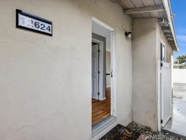 a living room with a couch and a table