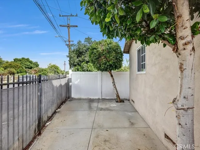a blue couch sitting on top of a wooden floor