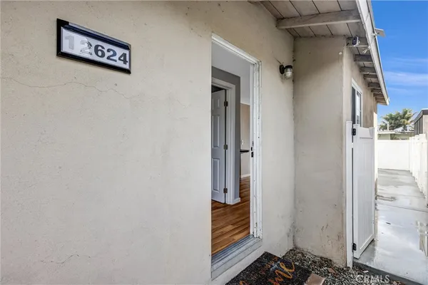 a view of a backyard of the house