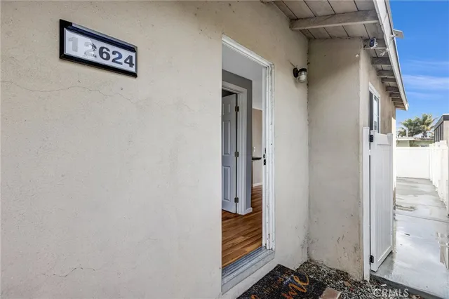 a view of a backyard of the house