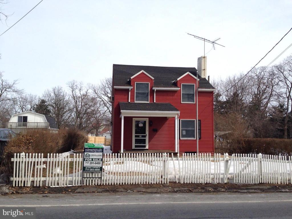 59 Petersburg Road Lancaster, PA 17601 - Photo 1 of 11 a front view of a house with a garden