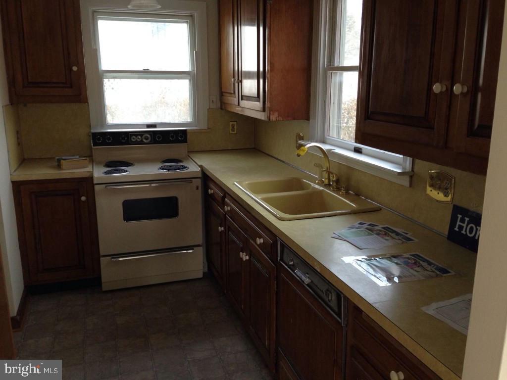 59 Petersburg Road Lancaster, PA 17601 - Photo 4 of 11 a kitchen that has a sink and a stove