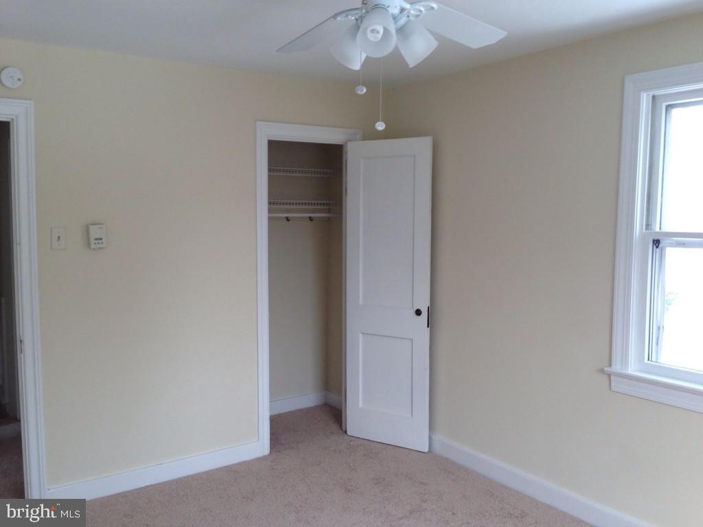 59 Petersburg Road Lancaster, PA 17601 - Photo 9 of 11 an empty room with windows and closet